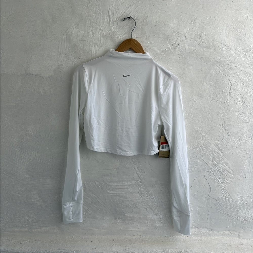 white Nike Dri-FIT One Luxe
Women's Long-Sleeve Cropped Top
